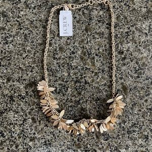 NWT, JCREW Gold necklace with gold metal almond shape clusters.